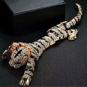 Articulated tiger shoulder  brooch